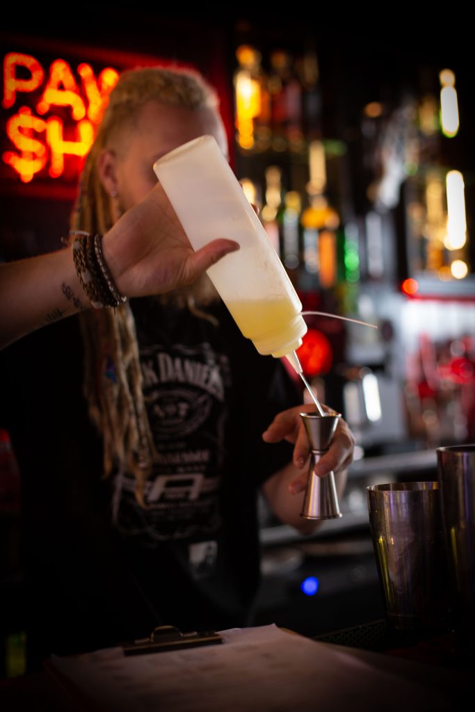Barman from the Pawnshop making cocktails